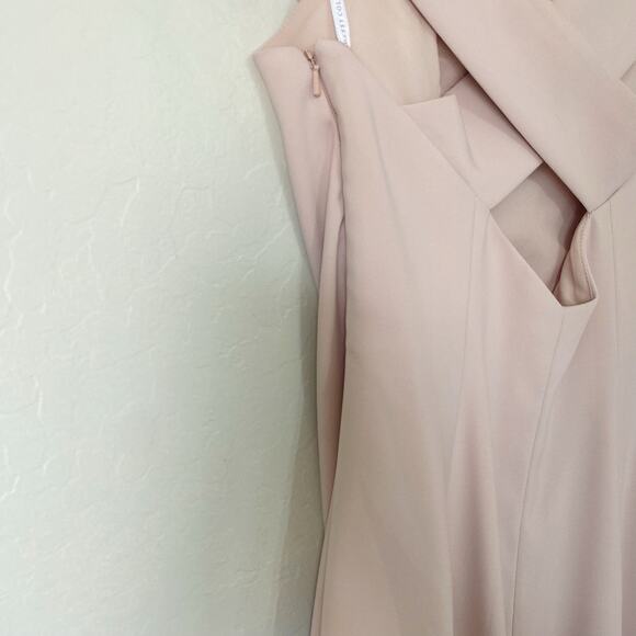 Dessy Off-The-Shoulder Criss Cross Back Trumpet Bridesmaid Gown in Blush Pink - Picture 8 of 9